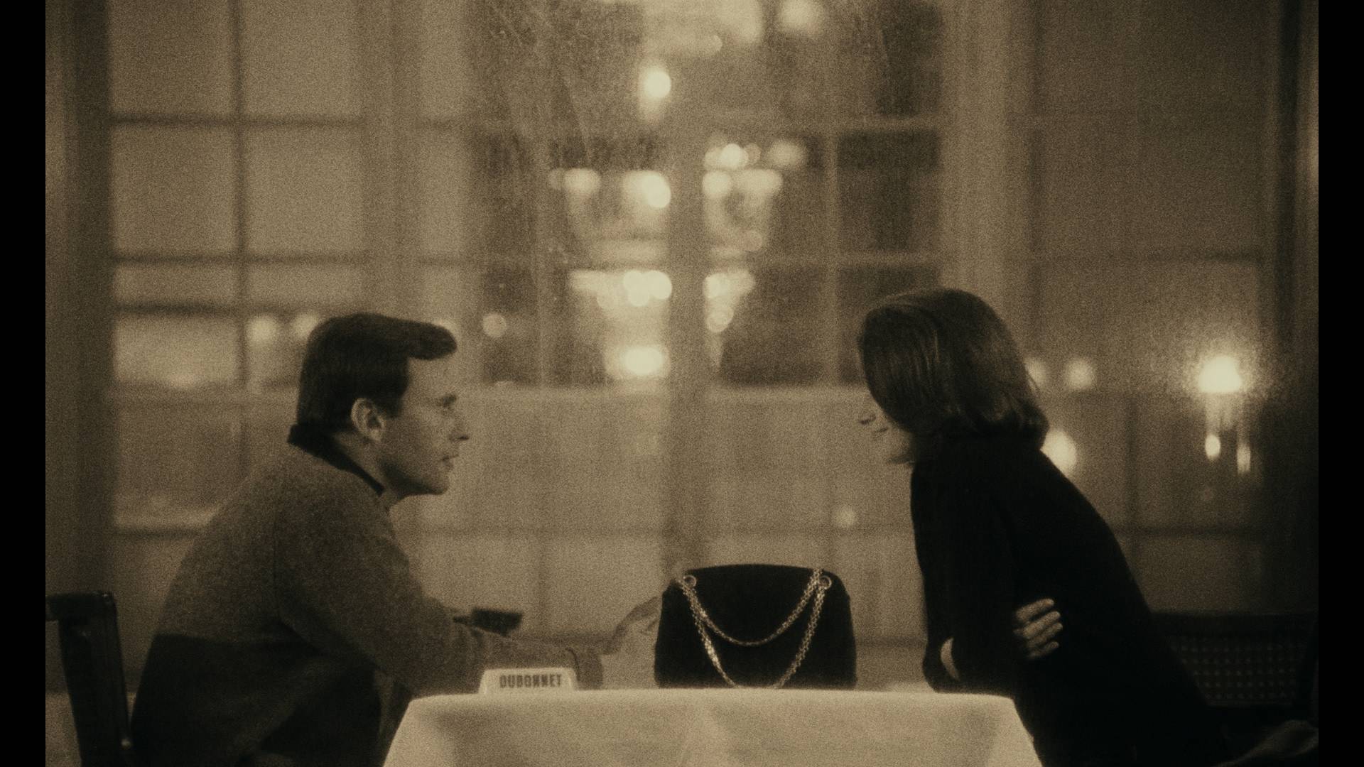 “Um Homem, Uma Mulher” (1966): entre Jean-Louis Trintignant e Anouk Aimée, uma bolsa Chanel